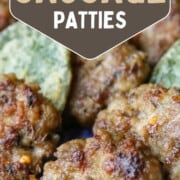 fried sausage patties on a blue platter.