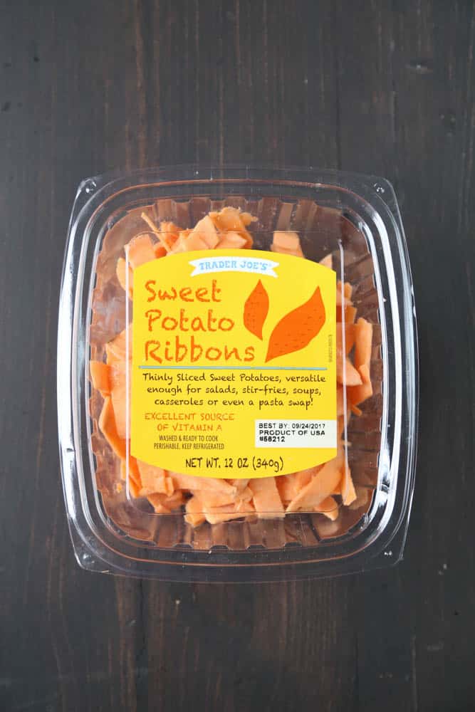 sweet potato ribbons in a plastic clamshell container.