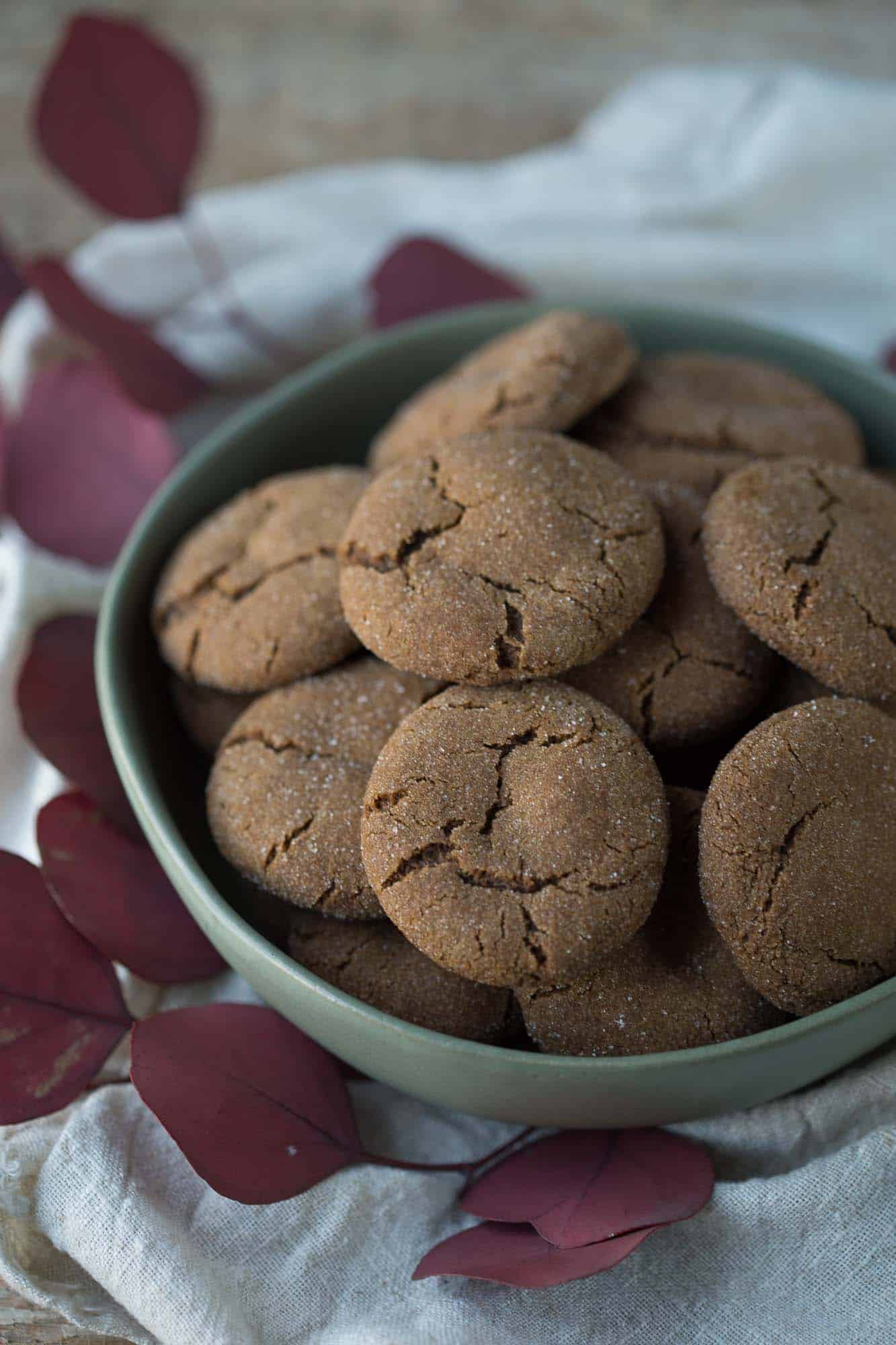 classic ginger cookies in a green bowl.