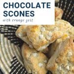 black and wicker basket filled with white chocolate chip scones.