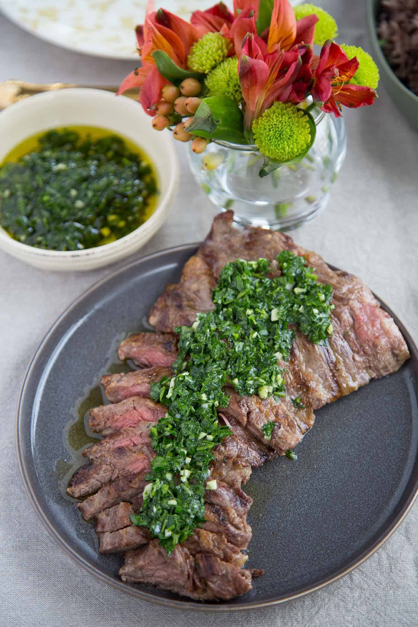 Skirt Steak Chimichurri on a gray plate.