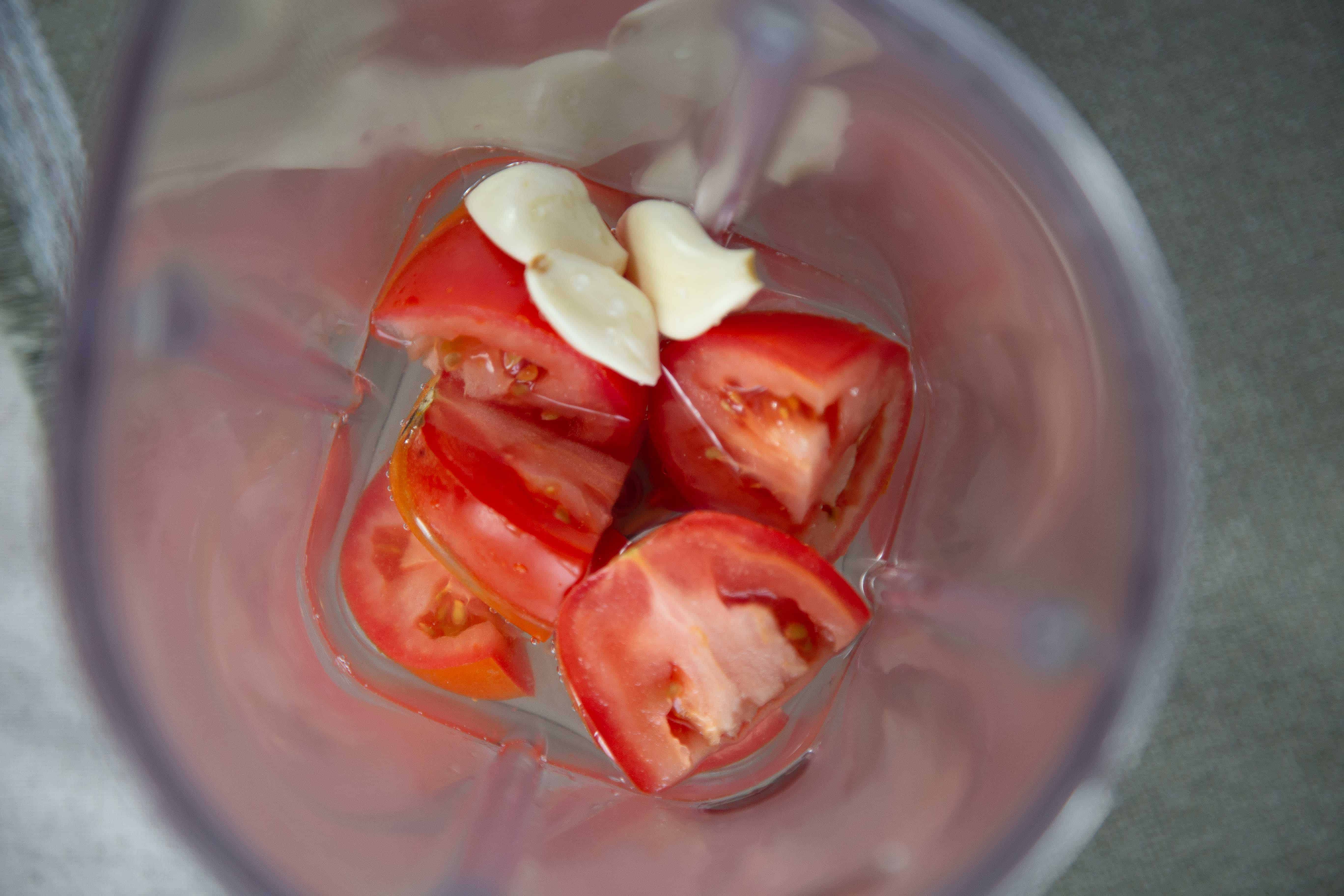 tomatoes, garlic and water in a blender