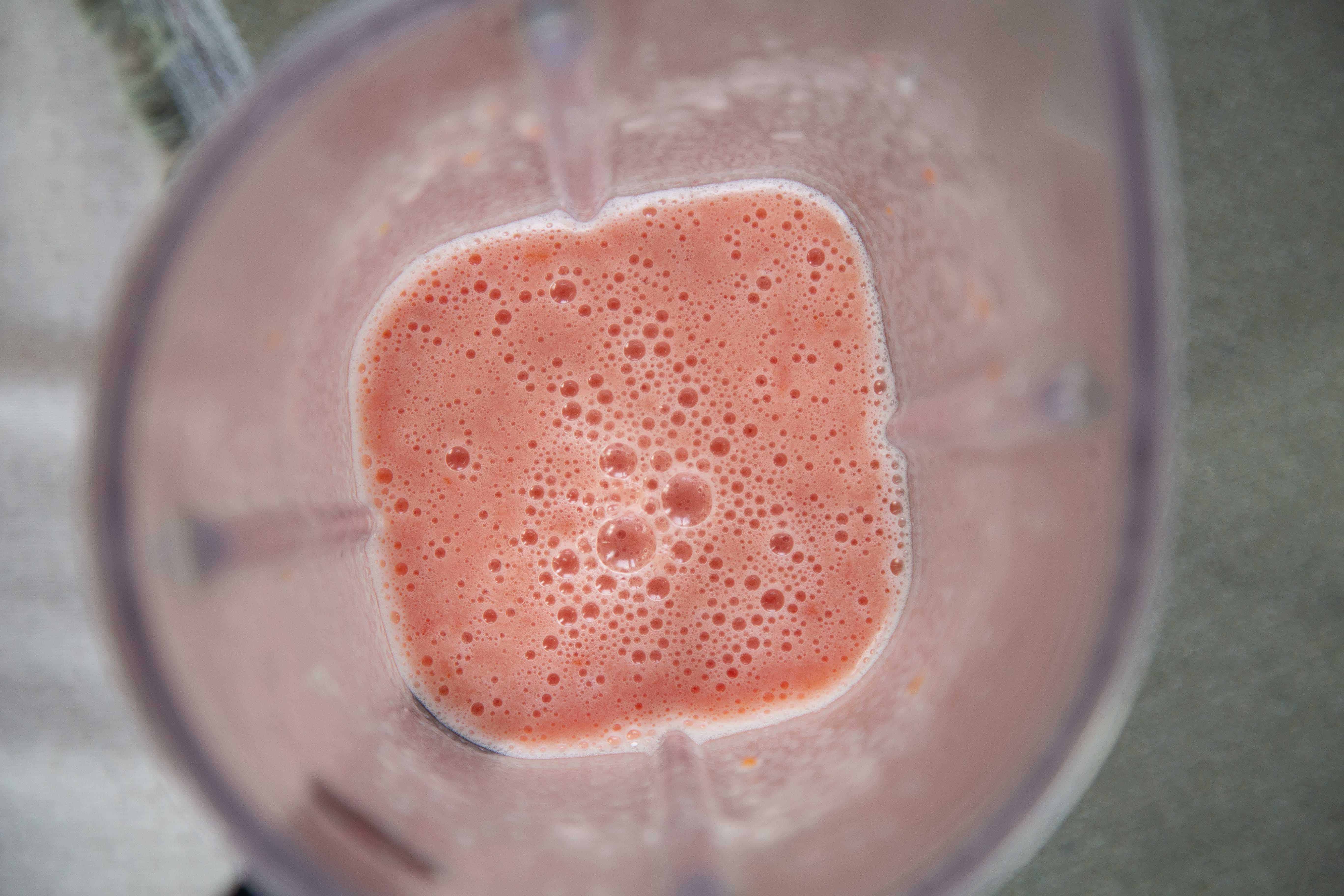 blended garlic and tomatoes in a blender