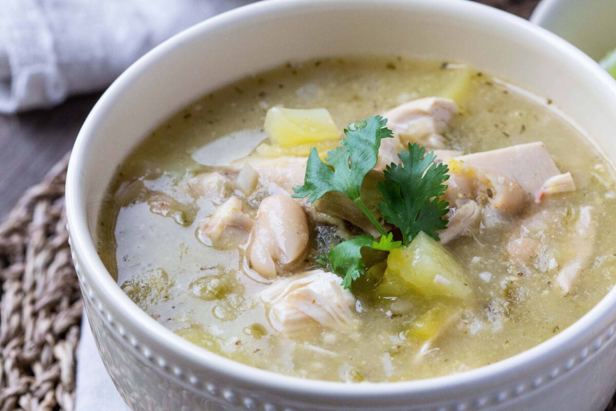 White Chicken Chili with Beans and Potatoes topped with cilantro