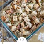 sourdough stuffing in a casserole dish on a thanksgiving table.