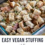 sourdough stuffing in a casserole dish on a thanksgiving table.