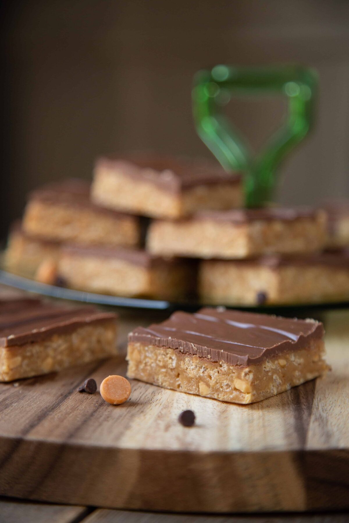 special k bars cut into squares on a circular wooden board.