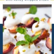 grilled peaches with whipped cream and mint sprigs.