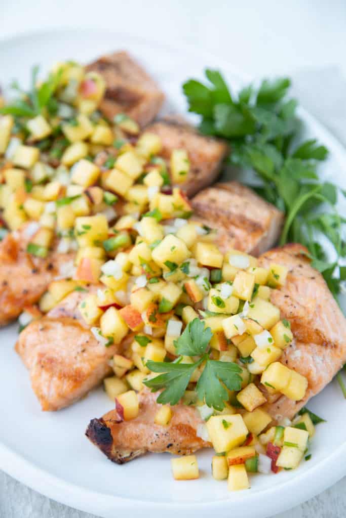 Salmon fillets topped with nectarine salsa