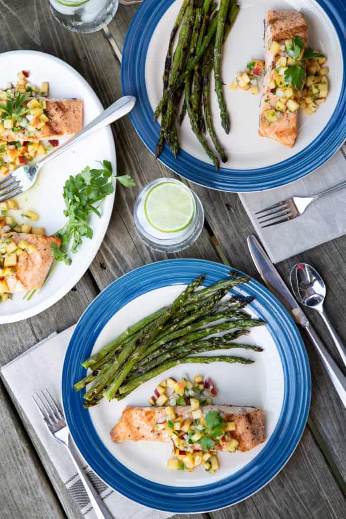 Dinner plates with salmon and asparagus