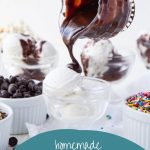 hand pouring hot fudge on top of a glass dish of ice cream