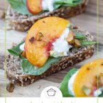 a peach slice, a dollop of burrata, and arugula on a whole wheat toast