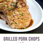 glazed pork chops on a white platter