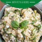 zucchini risotto with herbs in a green bowl