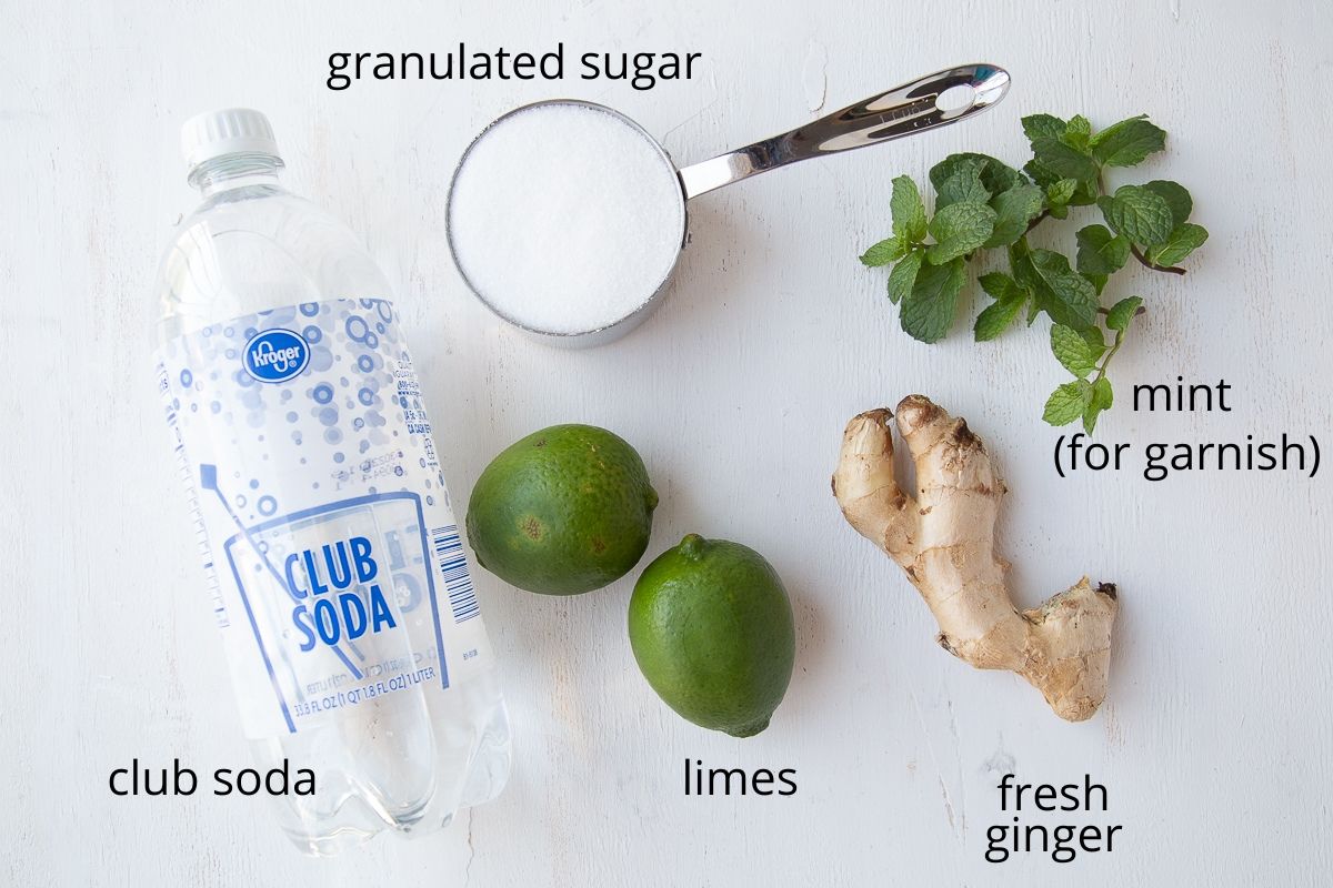 ingredients for ginger ale on a white background