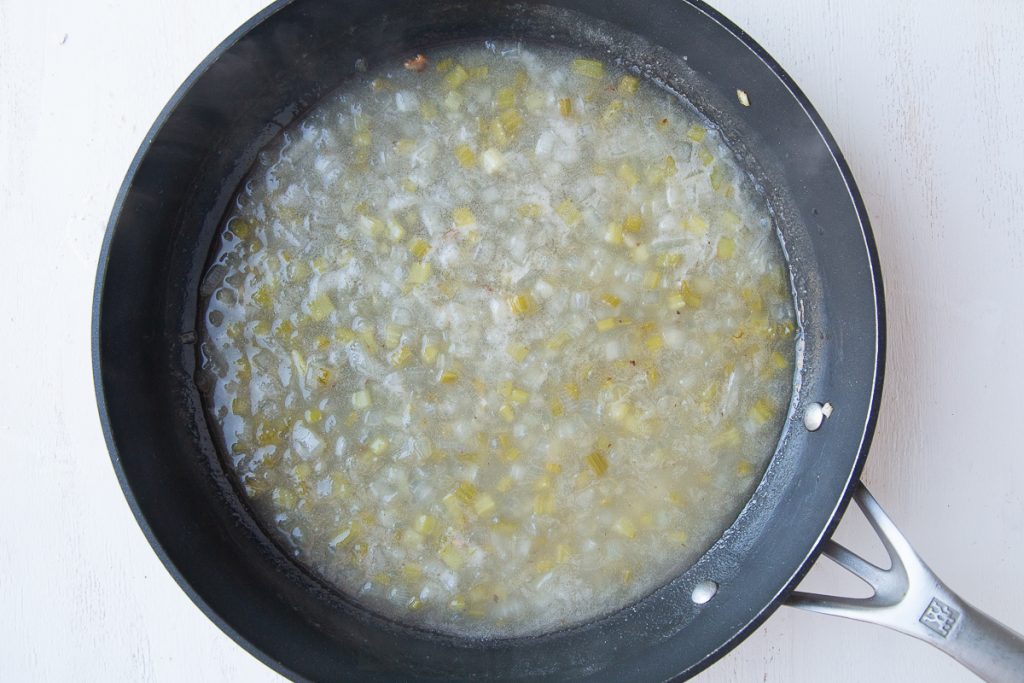 dressing for german potato salad, cooking in a skillet