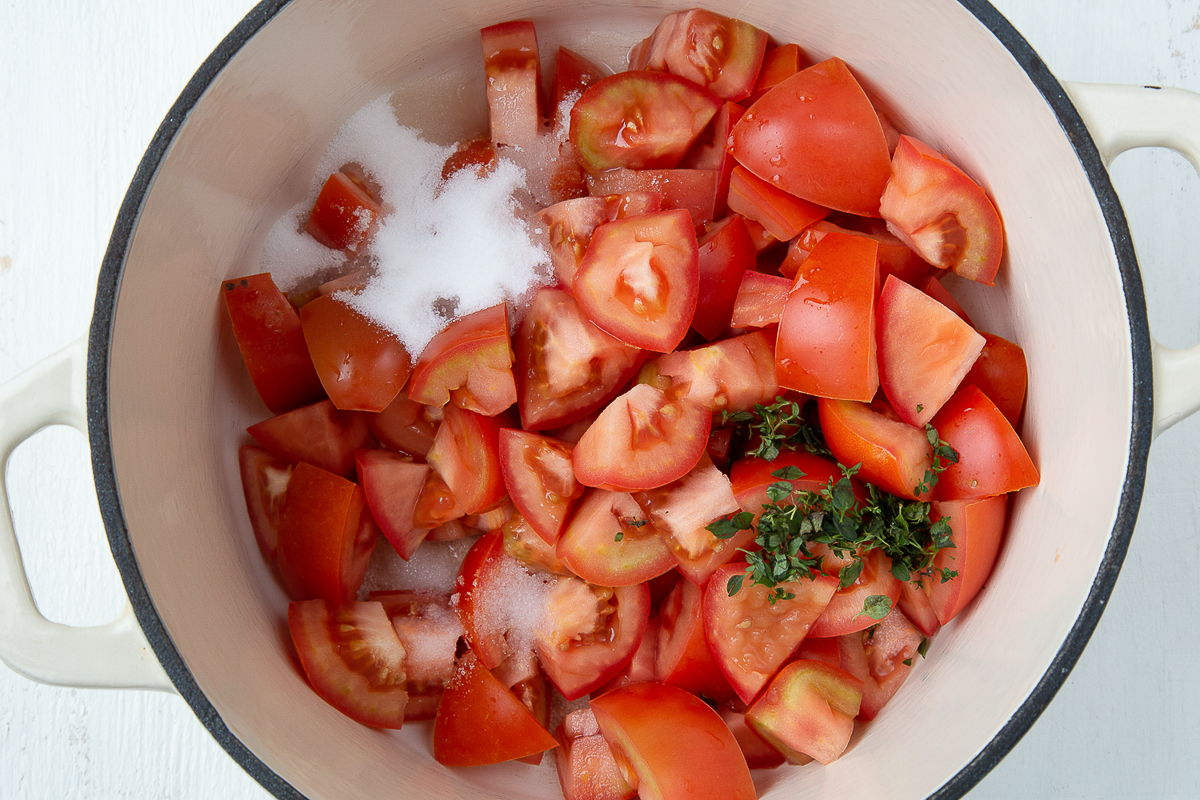 tomato jam ingredients in a dutch oven