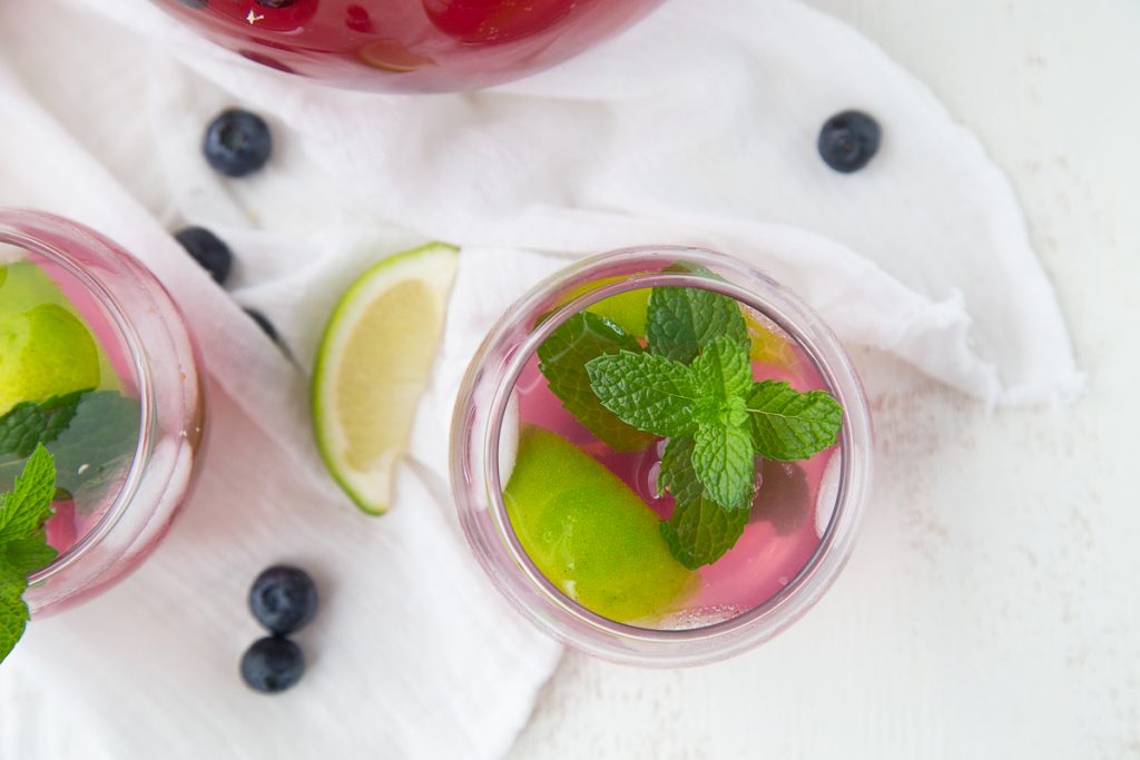 blueberry mojito with mint in a small glass