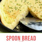 spoon bread in a cast iron skillet with a wedge taken out