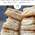 flaky southern biscuits stacked on a glass platter