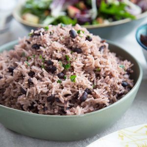 cuban black beans and rice in a green bowl