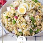 tuna pasta salad in a white bowl.