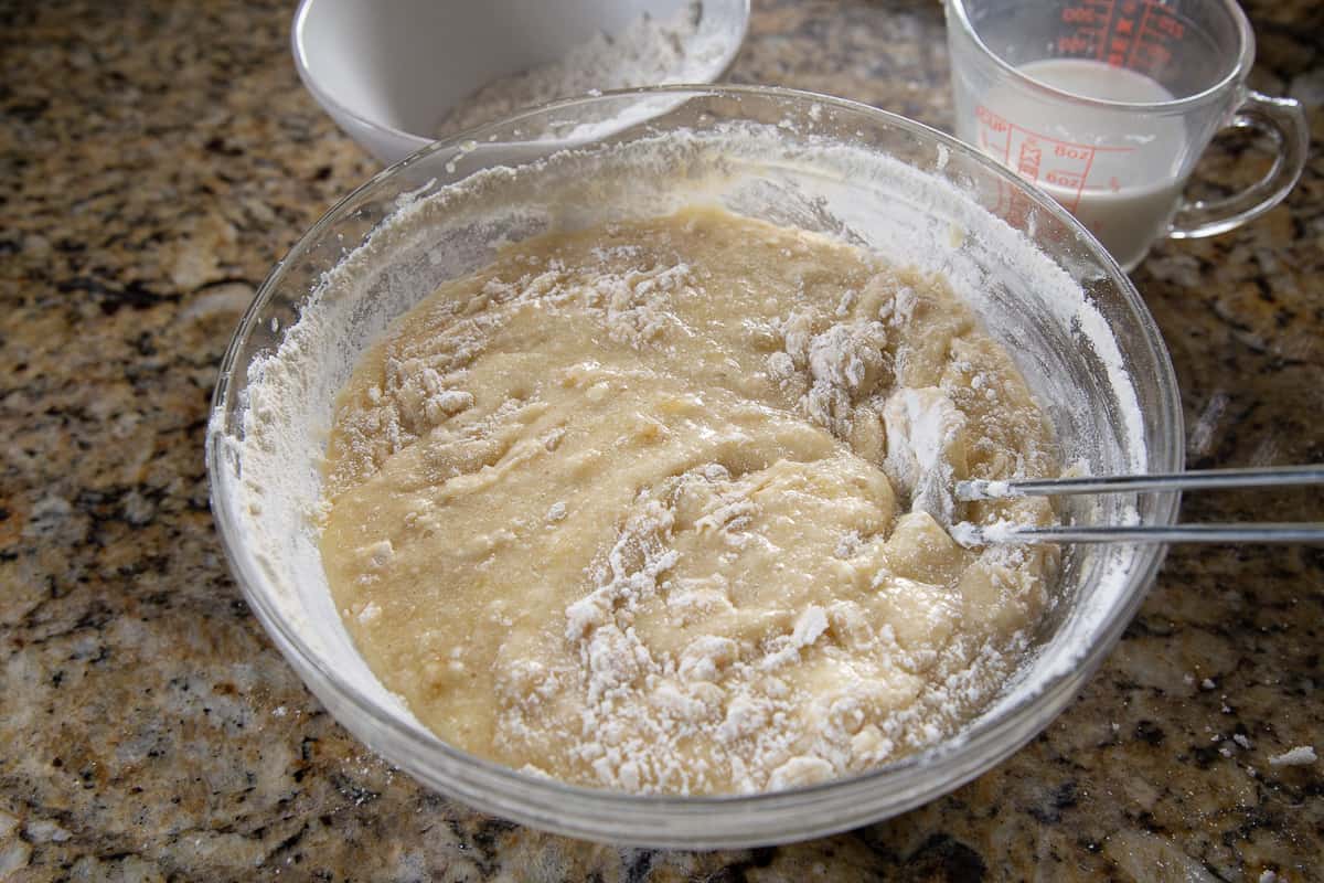 banana cake batter in a glass bowl.