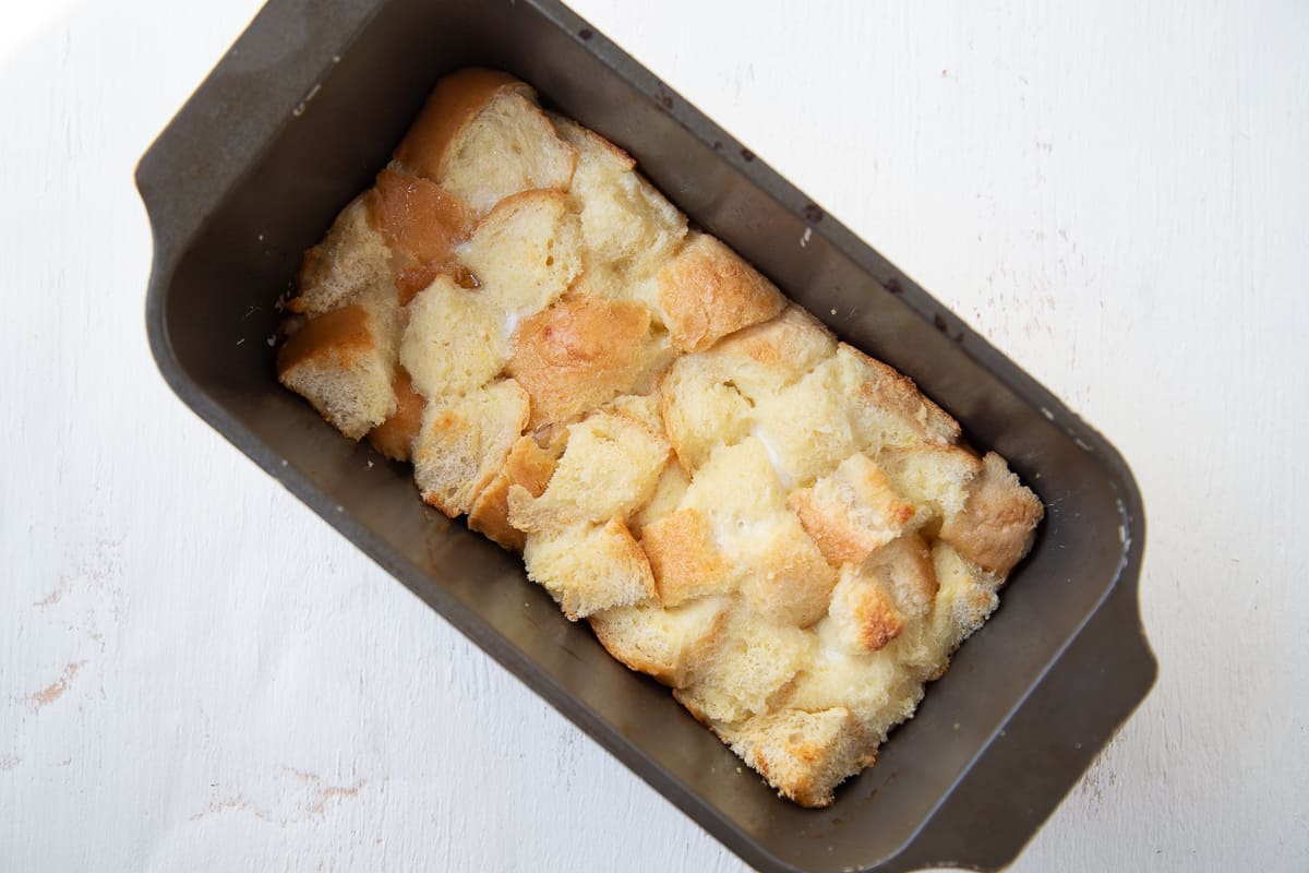 cooked bread pudding for two in a loaf pan.