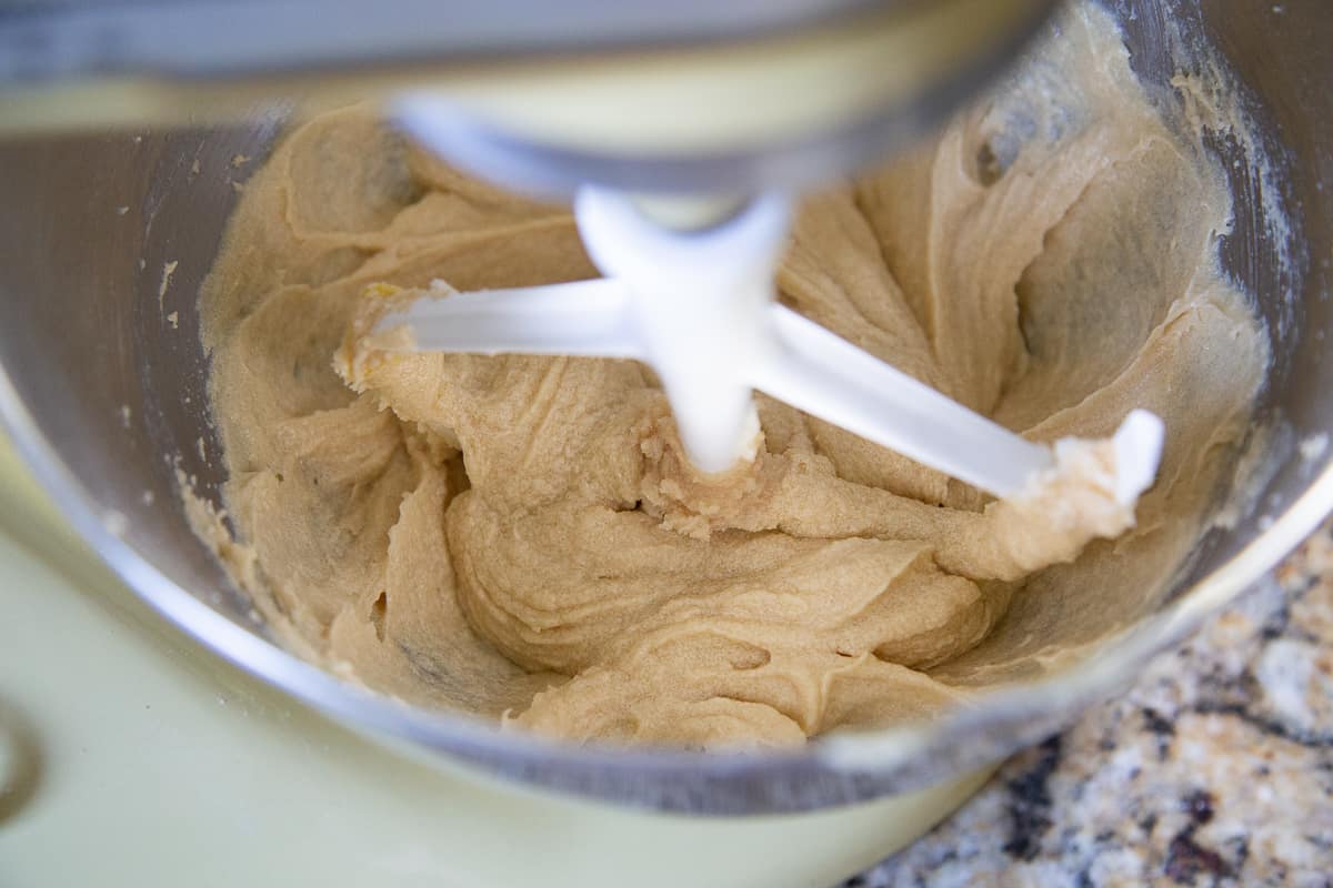 sugar, butter, and eggs in the bowl of a stand mixer with a paddle attachment.