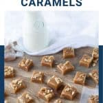 walnut caramels on a wooden board with a glass of milk in the background.