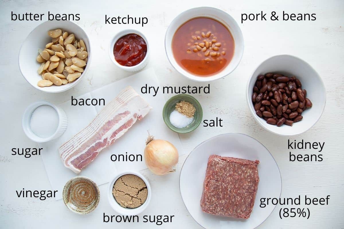 calico beans ingredients on a white table.