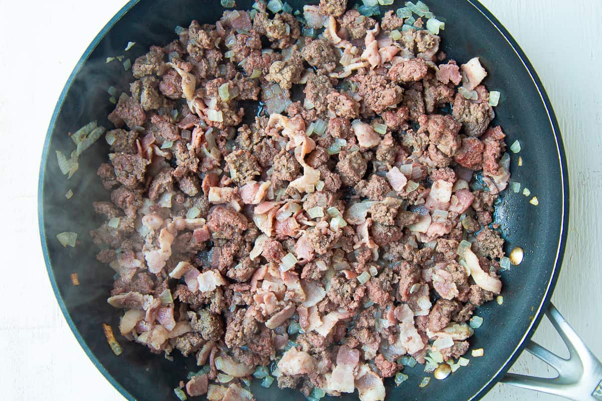 beef, bacon, and onion in a nonstick skillet.