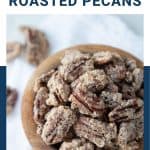 cinnamon roasted pecans in a wooden bowl.
