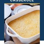 corn casserole in a white casserole dish.