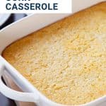 corn casserole in a white casserole dish.