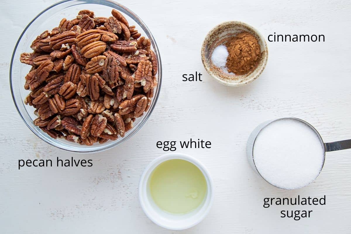 ingredients for roasted pecans on a white table.