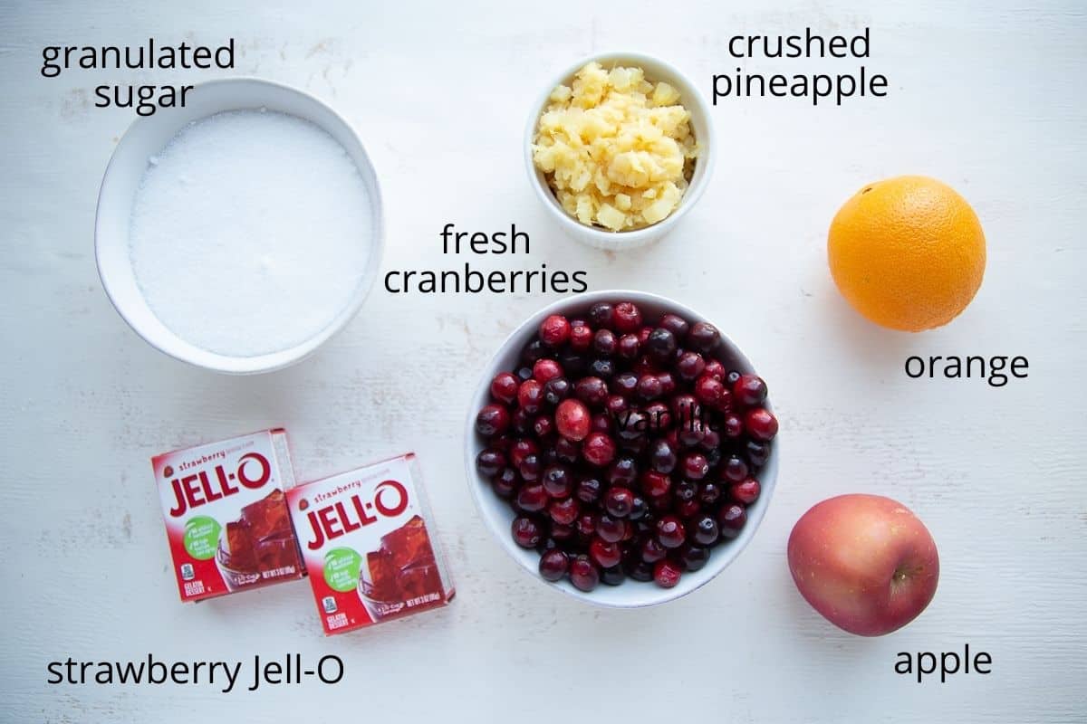 ingredients for cranberry jello salad on a white table.