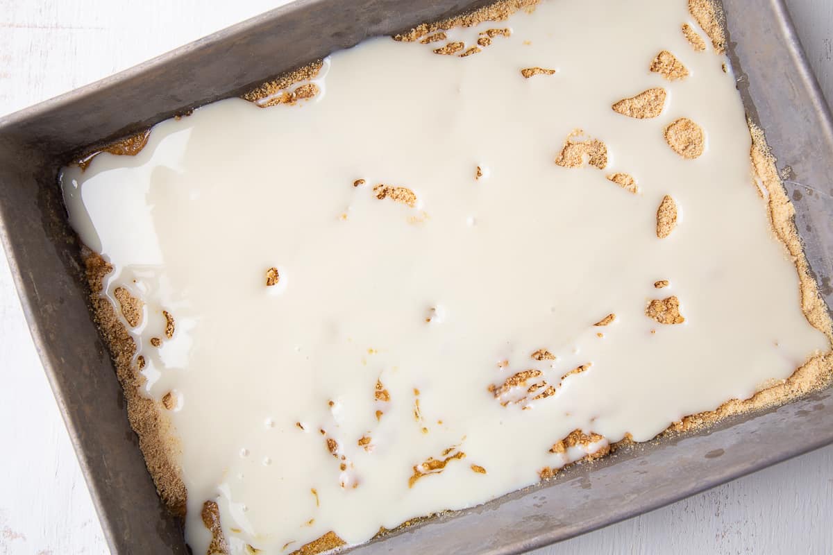 sweetened condensed milk poured over a graham cracker crust.