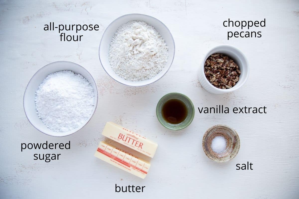 ingredients for snowballs on a white table.