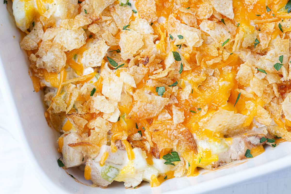 close-up of hot chicken salad, topped with potato chips.