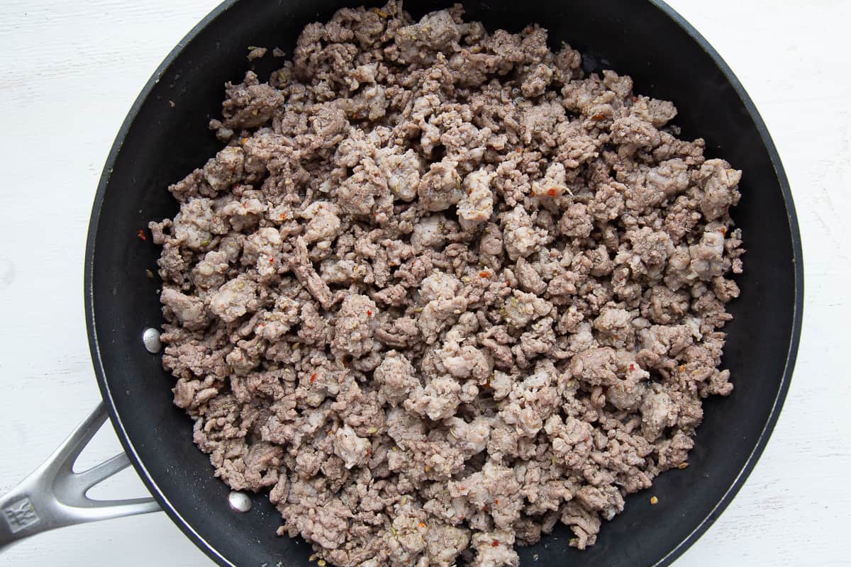 cooked sausage and beef crumbles in a nonstick skillet.