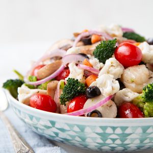 marinated vegetable salad in a low decorative bowl.