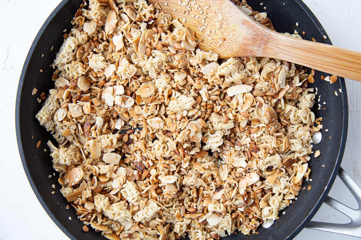ramen noodles, almonds, and sunflower seeds in a large nonstick skillet.