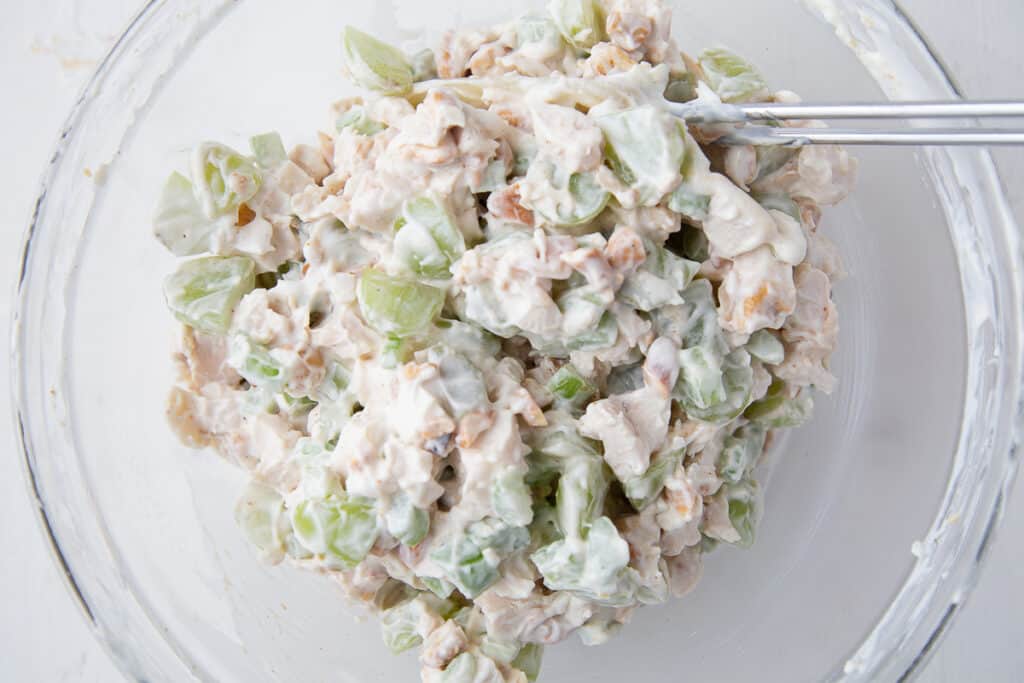 mixed chicken salad in a glass bowl.