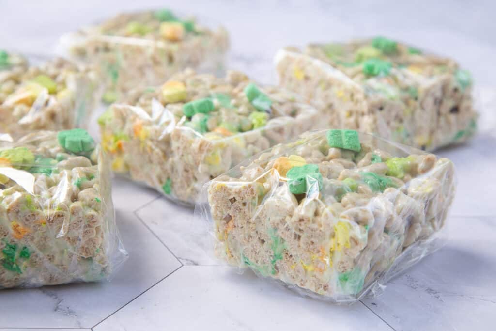 lucky charms treats wrapped in plastic wrap.