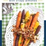 brown sugar glazed carrots topped with slivered almonds on a white lace platter.