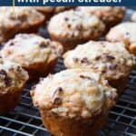 rhubarb muffins on a wire rack.