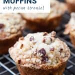 rhubarb muffins on a wire rack.