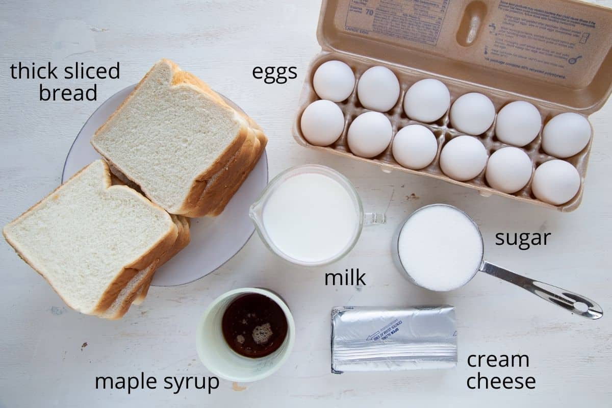 stuffed french toast ingredients on a white table.