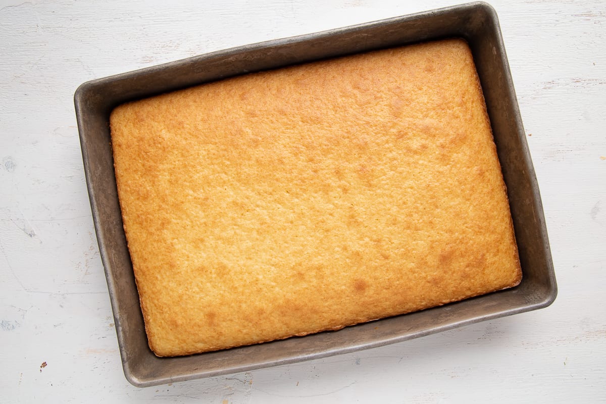 white cake baked in a 9x13 inch pan.